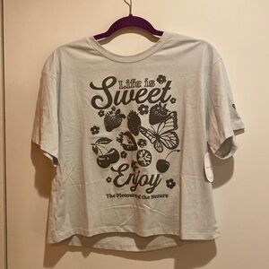 House of Cotton, LG  Cropped T- Shirt in pale brown w/dark green print. NWT